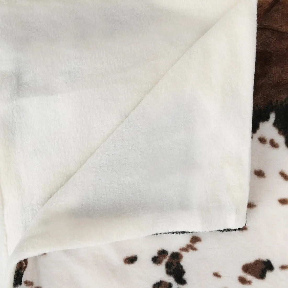Atmosphera fleece plaid met koeienprint – wit/bruin fleecedeken, 130 x 160 cm – foto 3